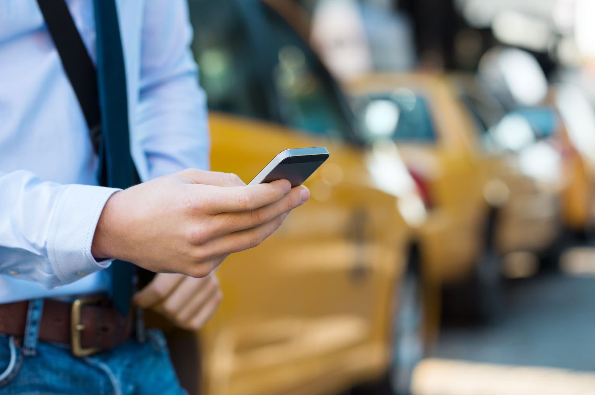 calling-a-taxi-with-phone-P83TSZB